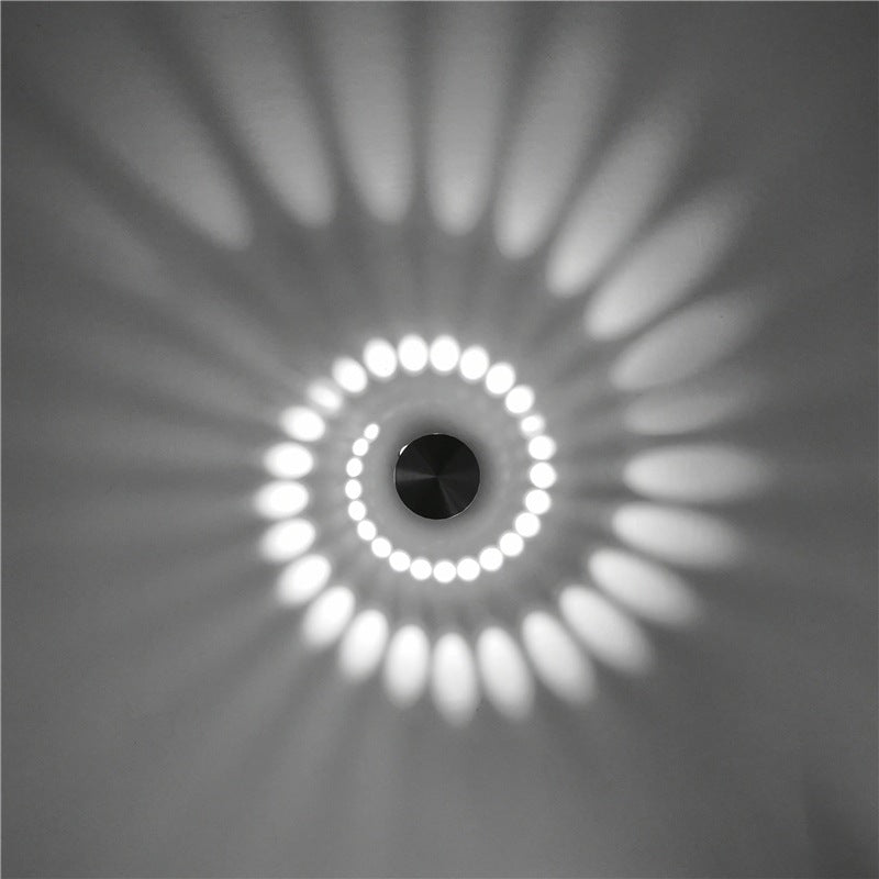 Nimbo - Kleine LED Wandlamp met Spiraal Lichteffect